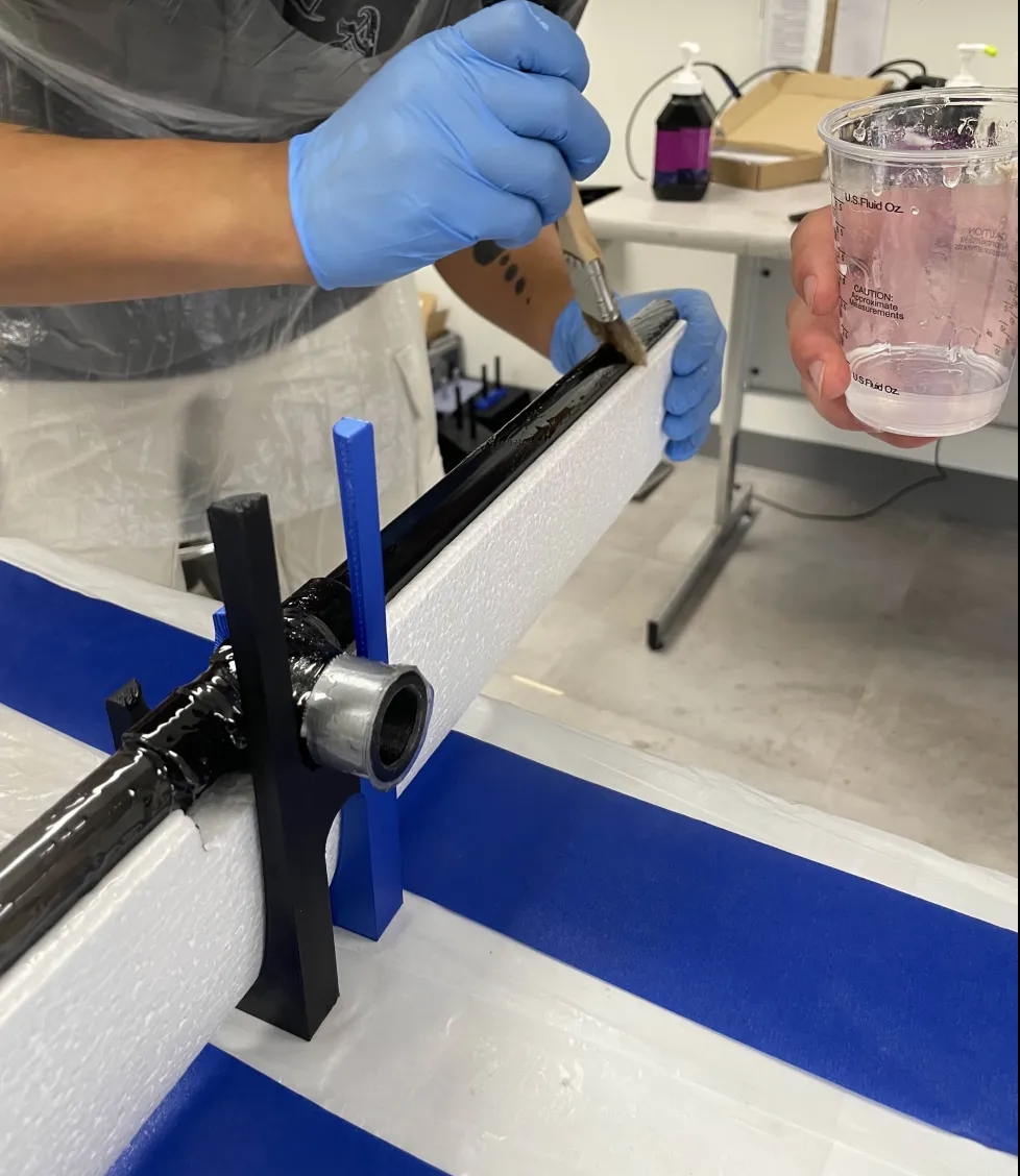 Resining the carbon fiber tubing to the foam wing